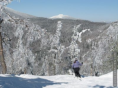 Skiing in some fresh snow and sunshine at Bolton Valley, Vt.